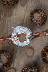 Wall Mural - Healthy raw energy balls with cocoa, coconut, nuts