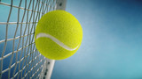 Tennis racket hits tennis ball. Closeup on blue background- 3d rendering