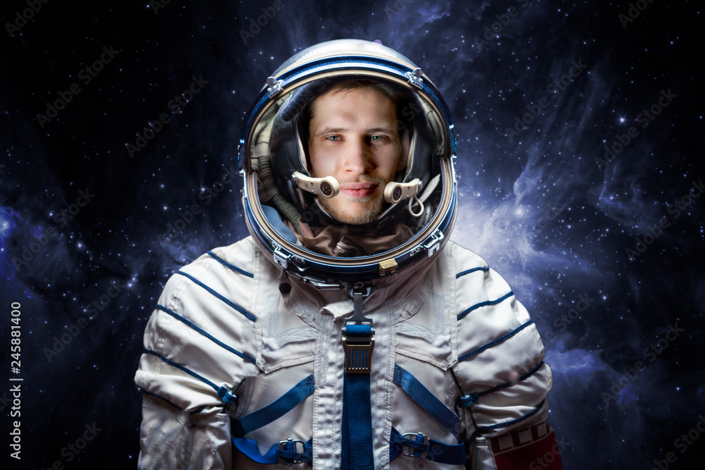 close up portrait of young astronaut completed space mission b. Elements of this image furnished by nasa - obrazy, fototapety, plakaty 