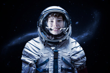 close up portrait of young astronaut completed space mission b. elements of this image furnished by 
