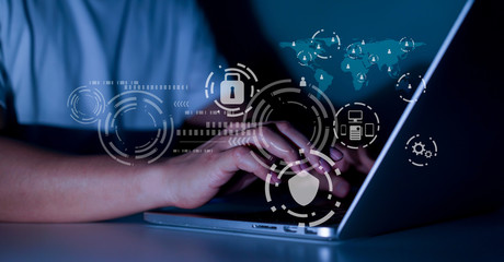 Wall Mural - close up businessman hand typing or working on laptop for programming about cyber security , advance