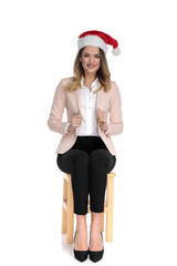 Sticker - happy santa claus businesswoman sitting  and pulls collar