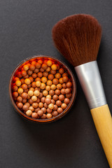 Canvas Print - Bronzer pearls and a make up brush