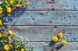© Maya Kruchancova - blue and yellow  flowers on old wooden background