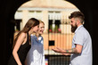 © Volodymyr - Friends meeting. Happy friends. Bearded man and pretty women smiling on street. Boyfriend dating girlfriends. People enjoying each others company. Bonds of friendship. Friendship begins with smile