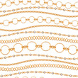 Assorted golden chains on white background.