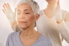 Woman Having Reiki Healing Treatment , Alternative Medicine Concept, Holistic Care