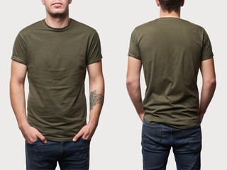 cropped view of tattooed man in basic khaki t-shirt with copy space isolated on white