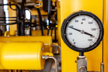 Pressure gauge or pressure indicator reading four hundred pressure square inch (psi)  in offshore oil and gas refinery process operation industry.