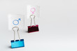 © Prostock-studio - Blue clip with male symbol forward pink with female one