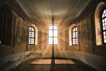 Old Deserted Church Interior With Sunlight Shining Through The Window