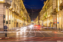 View Of Via Roma And Porta Nuova Railway Station At Night, Turin, Piedmont