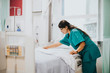 © Rawpixel.com - Nurse making the bed at a hospital