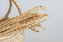 Rice In Basketry Isolated On Gray Background. Concept For Traditional Hand Craft