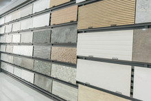 Colorful Samples Of A Stone Tile In Store. Marble And Granite Flooring A Most Popular Choice For Modern Kitchens And Bathrooms