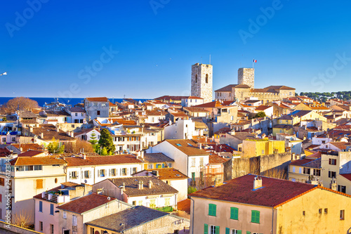 Fotomural Historic French riviera old town of Antibes seafront and rooftops view