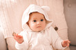 © morrowlight - Sweet baby girl 1-2 year old wearing cute hoodie in room. Childhood.