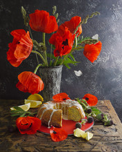 Homemade Pound Lemon Cake With Poppy Seeds. Red Poppy Flowers And Flying Butterflies