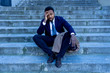 © SB Arts Media - Sad business man suffering from depression in total despair hopeless and frustrated in city stairs