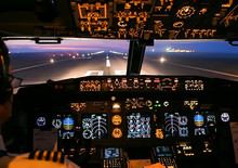 Cockpit Of A Passenger Plane. View From The Cockpit During