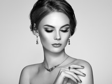 Portrait Beautiful Woman With Jewelry. Model Girl With Magnificent Manicure On Nails. Elegant Hairstyle. Fashion Make-up Arrows. Beauty And Accessories