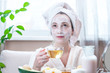 © Artem - Beautiful young woman with natural cosmetic mask on her face. Concept skin care and Spa treatments at home