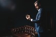© opolja - Degustation, tasting. Man with beard holds glass of brandy. Tasting and degustation concept. Bearded businessman in elegant suit with glass of whiskey