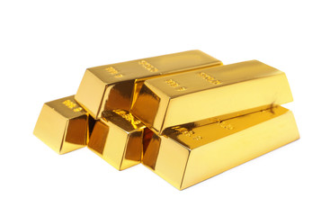 Precious shiny gold bars on white background