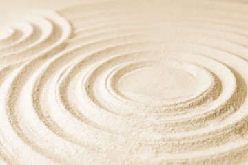 Zen garden pattern on sand. Meditation and harmony