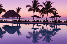 Pinkish Purple Sunrise Colors Reflecting In The Water In Fiji