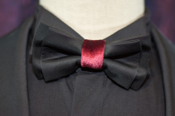 Wall Mural - black bow tie with cherry-colored