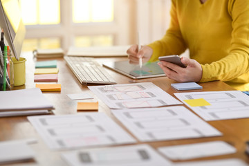 UX designer creative planning application development for web mobile phone in studio