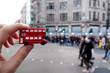 man with a londoner red double-decker bus