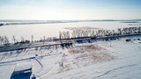 Fototapeta Na ścianę - Aerial View of the Snow Road in Winter