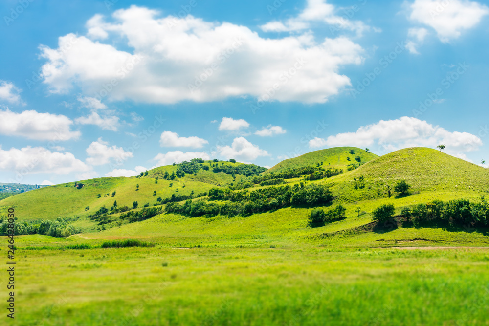 green hill in summer landscape. beautiful countryside scenery. fluffy ...