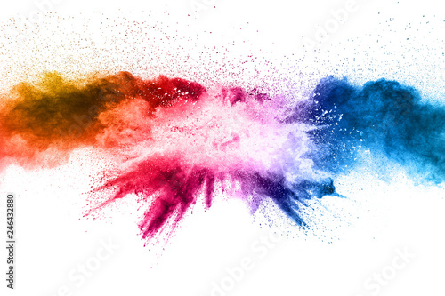 Multi color powder explosion on white background.