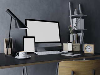 Wall Mural - 3d realistic render of mock up template of blank screen of computer, tablet on left and phone on right for your design works in trendy indoor workspace on messy designer desk in three quarter view
