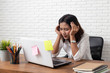 © suriya - Desperate businesswoman worried in office
