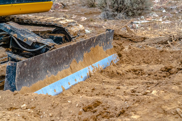 Wall Mural - Grader blade attached to excavator in Utah Valley