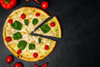 © александр таланцев - Delicious   pizza on a concrete background. Top view of hot pizza.
