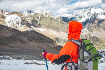 Wall Mural - young woman hiking in the mountains