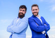 © be free - Business people concept. Bearded business people posing confidently. Business men stand blue sky background. Perfect in every detail. Well groomed appearance improves business reputation entrepreneur