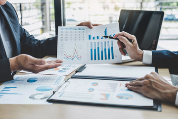 Leinwandbilder - Finance manager meeting discussing company growth project success financial statistics, professional investor working start up project for strategy plan with document, laptop and digital tablet