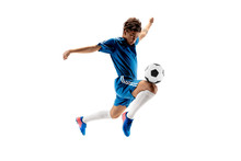 Young Boy With Soccer Ball Doing Flying Kick, Isolated On White. Football Soccer Players In Motion On Studio Background. Fit Jumping Boy In Action, Jump, Movement At Game.