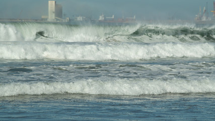 Wall Mural - Waves Crashing on Beach close up Morocco Africa