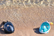 Two masks for snorkeling on the sandy beach near the sea, copy Space