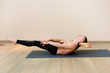 © protivnica - Sporty man practicing yoga on yoga class