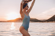 © pha88 - Girl with a gorgeous figure on the sea during sunset.Sexy girl on a wild beach.The girl in the water