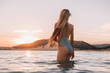 © pha88 - Girl with a gorgeous figure on the sea during sunset.Sexy girl on a wild beach.The girl in the water