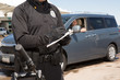 © Studio615 - Police writing a ticket